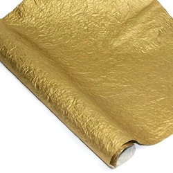 A partially unrolled gold paper called Metallic Mulberry Momi Paper, by Mulberry Paper. 